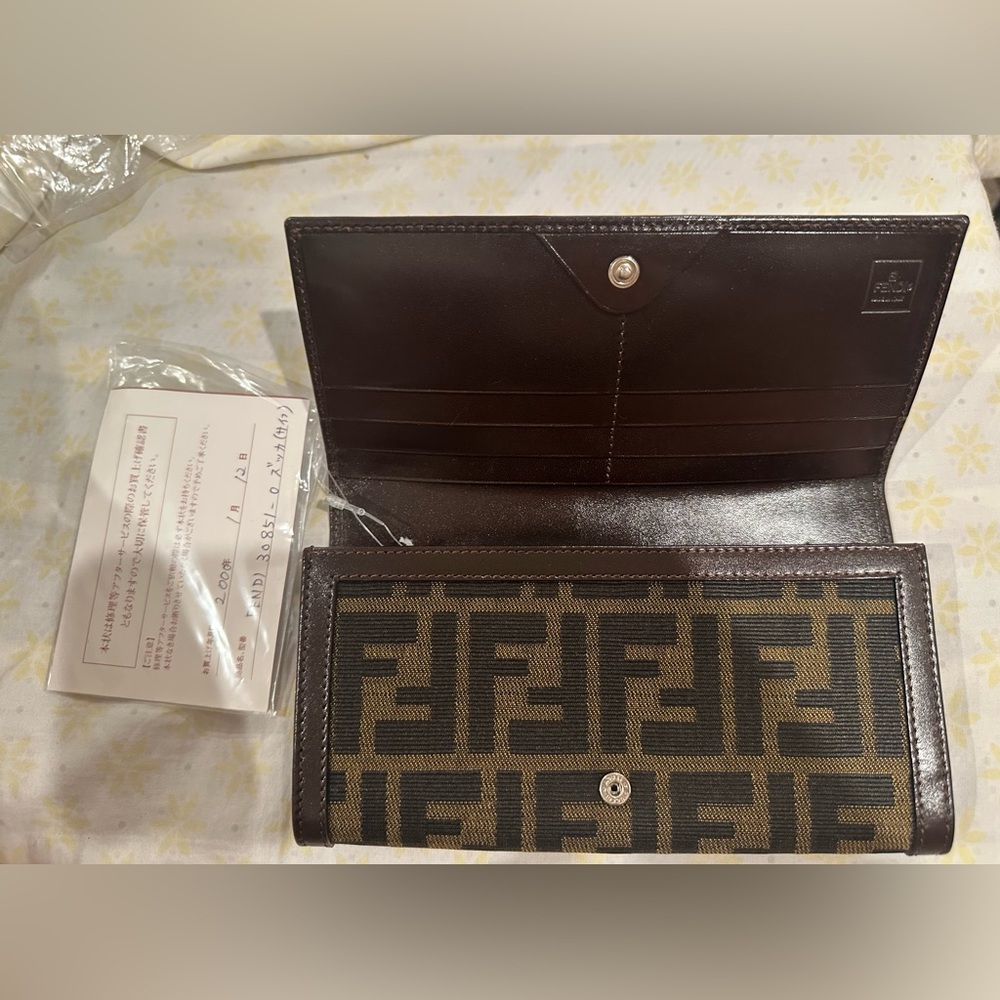 “Pre-loved” Fendi Zucca Canvas Larther Bifold Wallet